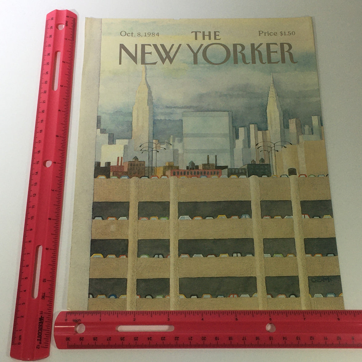 The New Yorker Magazine Cover from October 8, 1984, illustrated by Charles E. Martin, with dimensions and a ruler for scale, featuring an urban scene with the Empire State Building.