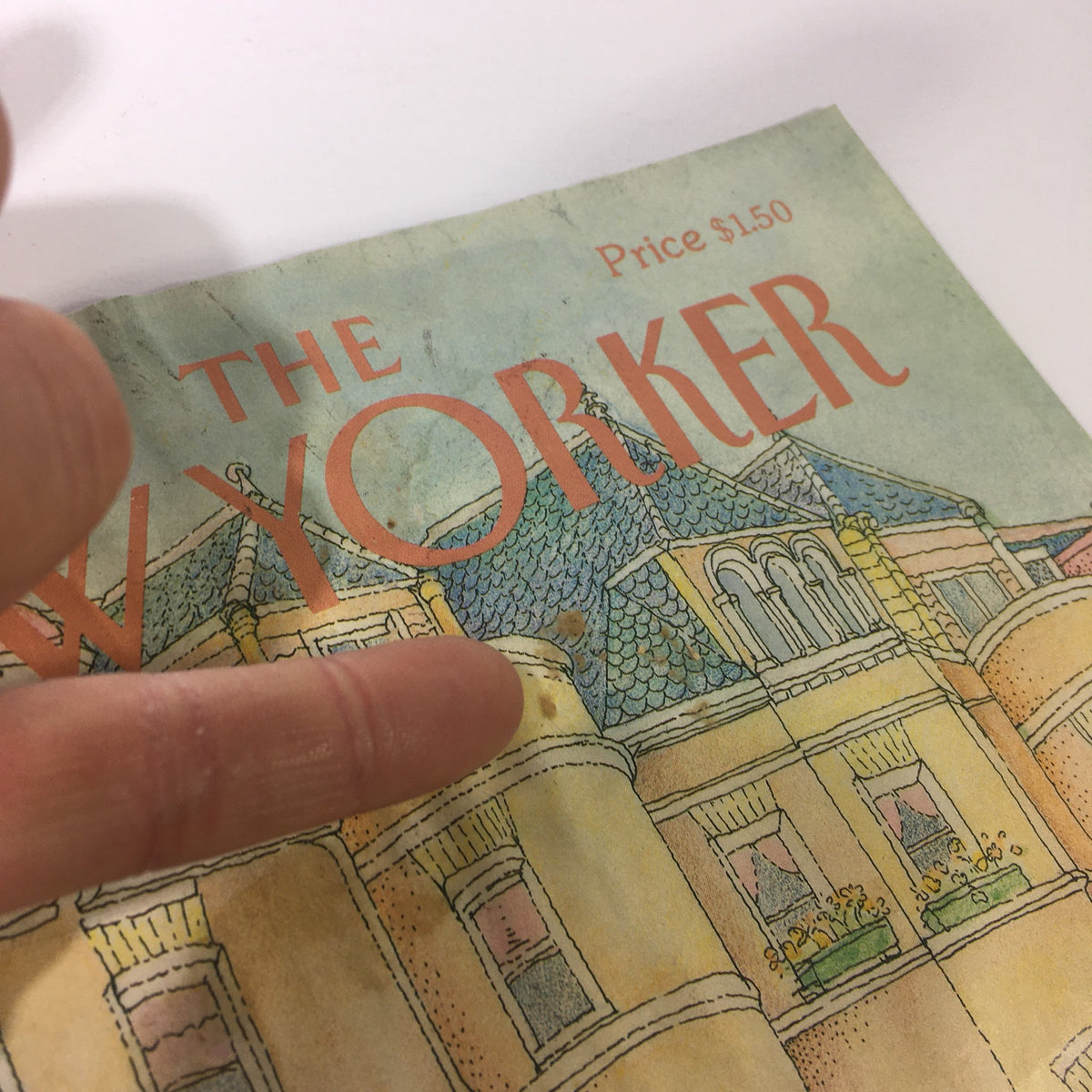 Close-up view of the cover of The New Yorker Magazine dated May 14, 1984, designed by Iris Van Rynbach, featuring a beautiful architectural illustration with some signs of wear.