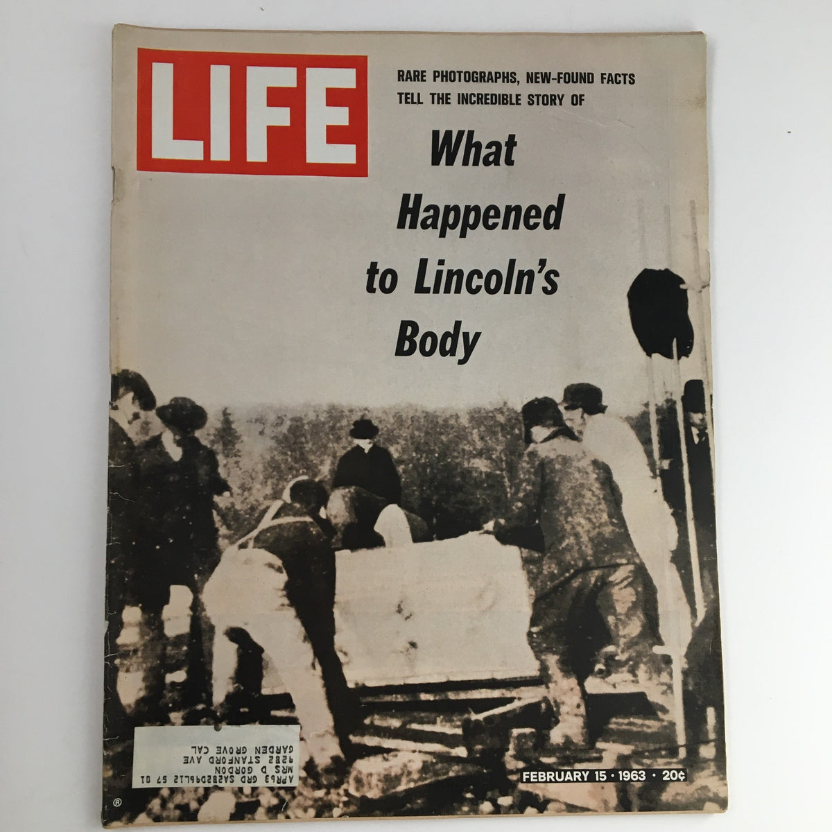 Cover of Life Magazine, February 15, 1963, featuring the title 'What Happened to Lincoln's Body' with an image depicting individuals near Lincoln's grave site. This historic issue explores the mystery of Abraham Lincoln's body, highlighting rare photographs and fascinating facts.