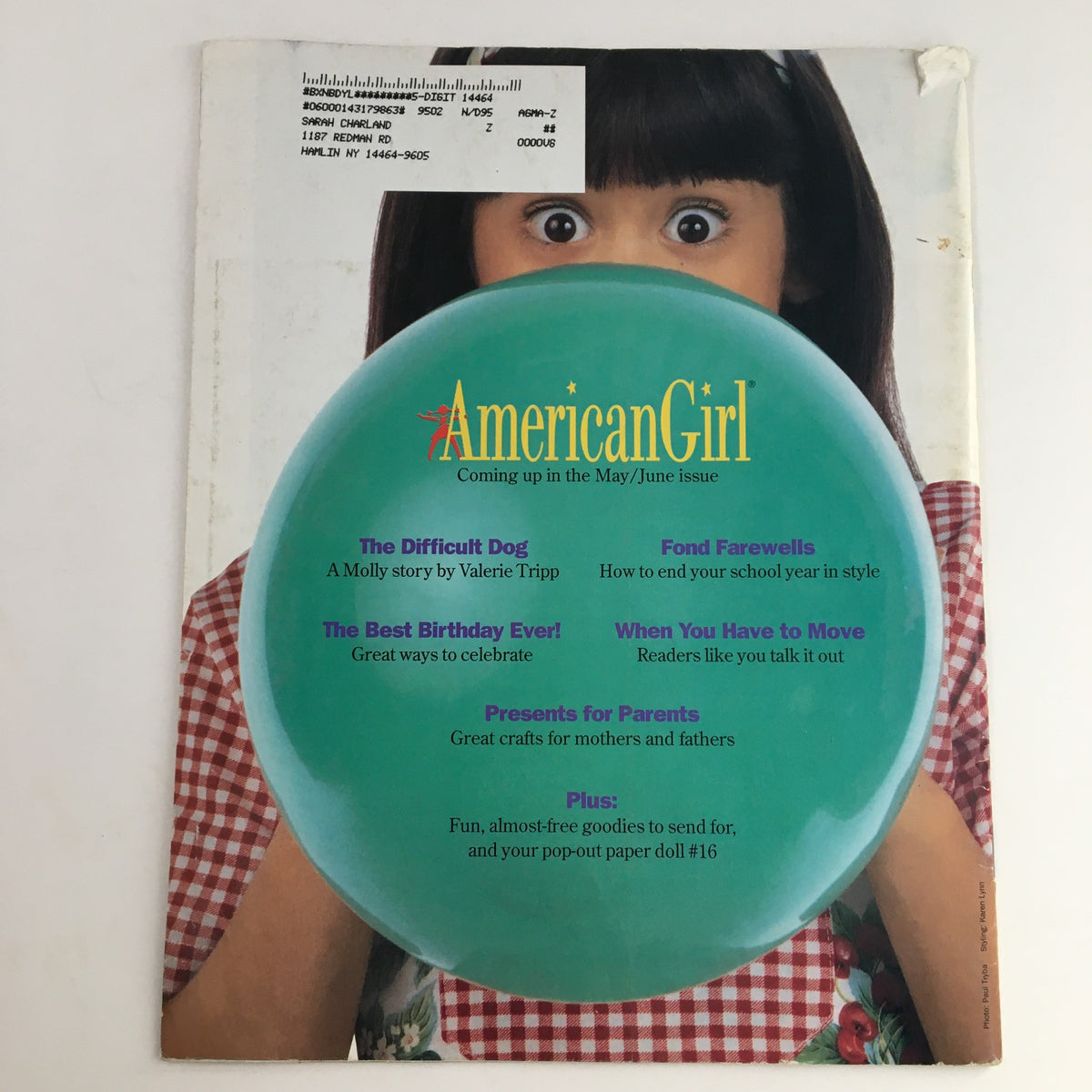 Back cover of American Girl Magazine March 1995 highlighting upcoming content and a vibrant balloon design.