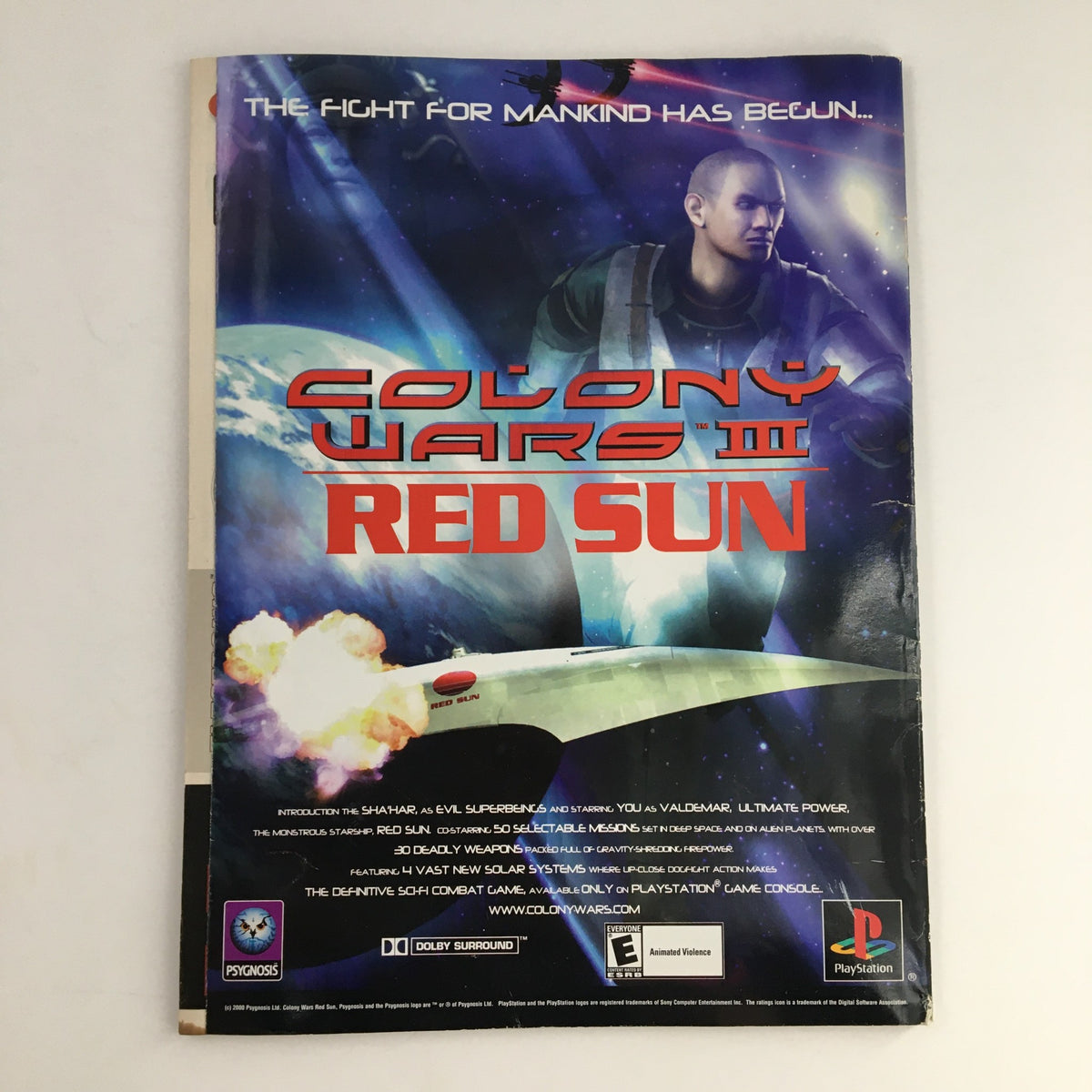 Back cover of PlayStation Magazine April 2000 featuring an advertisement for Colony Wars III: Red Sun with dramatic space-themed graphics.