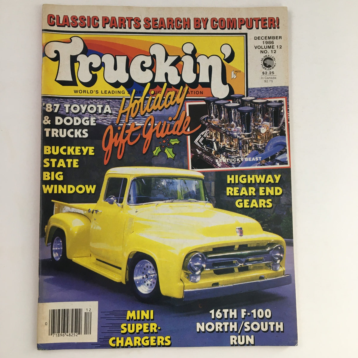 Truckin' Magazine December 1986 featuring Buckeye State Big Window design with a vintage yellow truck on the cover. Highlights include the Holiday Gift Guide and various truck parts features.