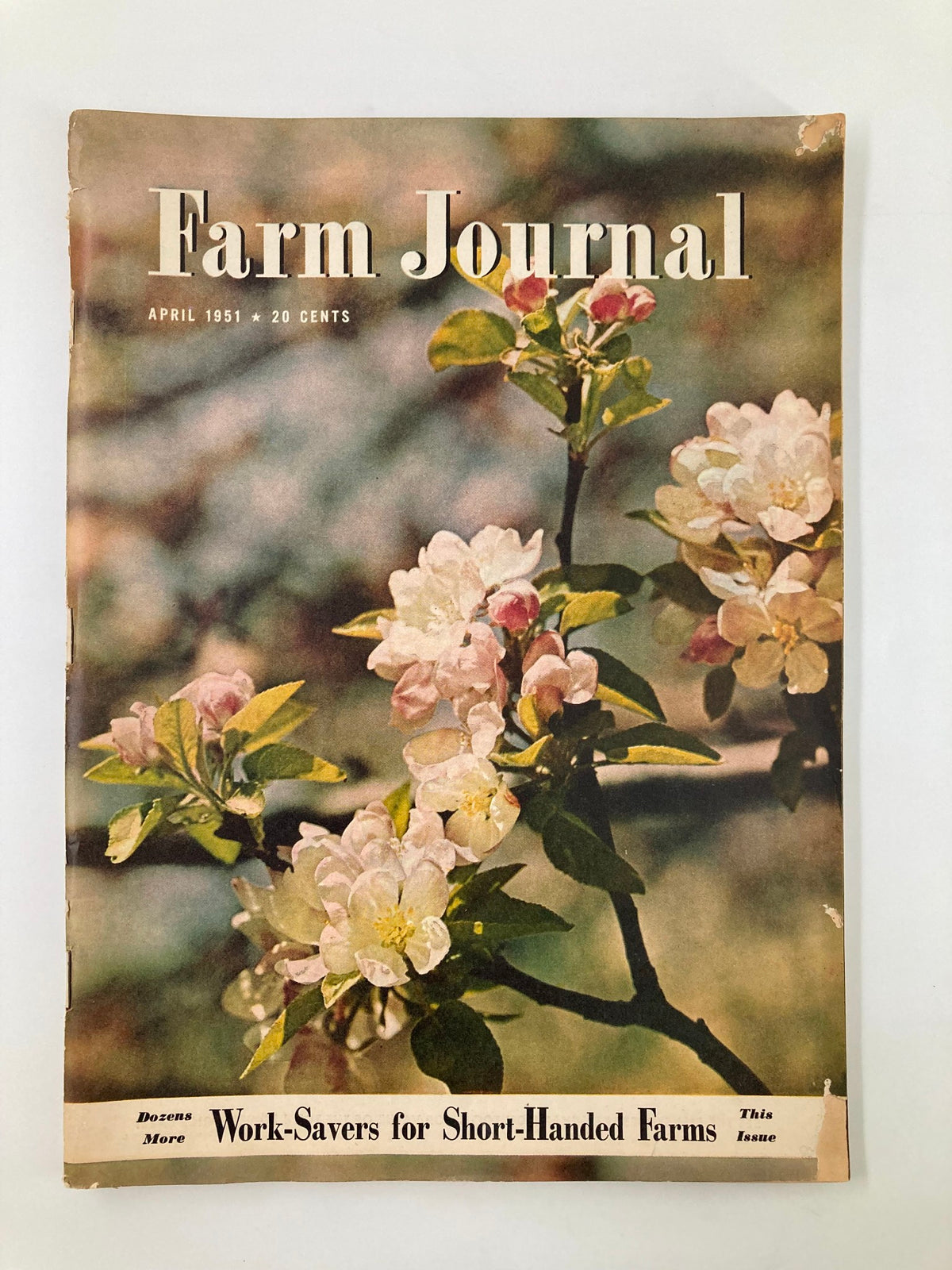 Cover of VTG Farm Journal Magazine April 1951 showcasing beautiful flowers and the title Work-Savers for Short-Handed Farms.