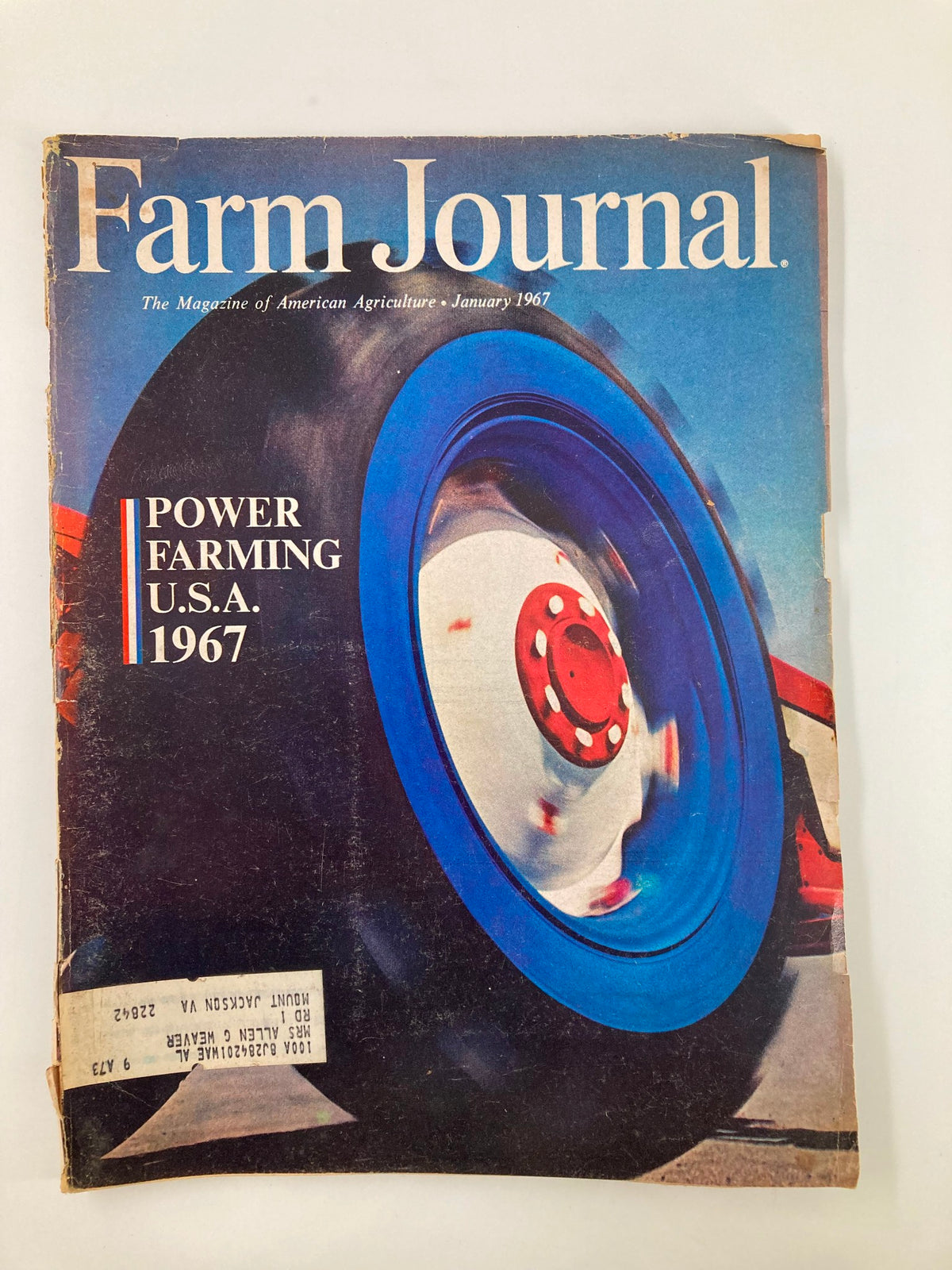 Cover of the Vintage Farm Journal Magazine from January 1967, titled 'Power Farming U.S.A. 1967', featuring a striking image of a blue tractor tire in motion.