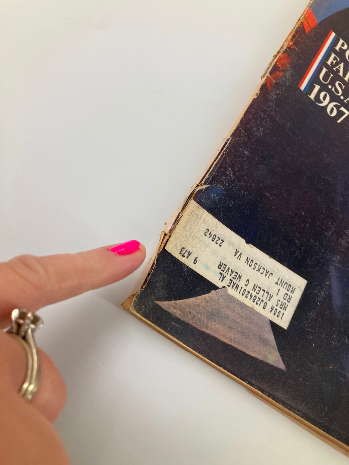 Close-up view of the Vintage Farm Journal Magazine from January 1967, highlighting the corner with a label on the cover, showcasing its vintage authenticity.