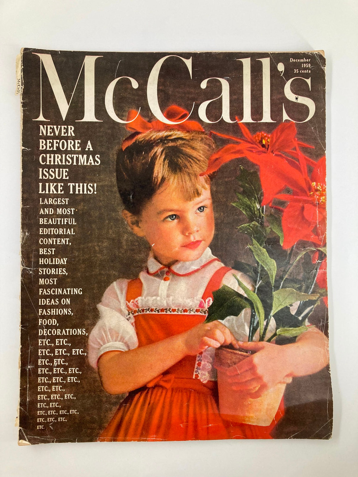 VTG McCall's Magazine December 1959 Cover featuring a young girl holding a potted plant, showcasing the festive theme of 'The Christmas Spirit'.