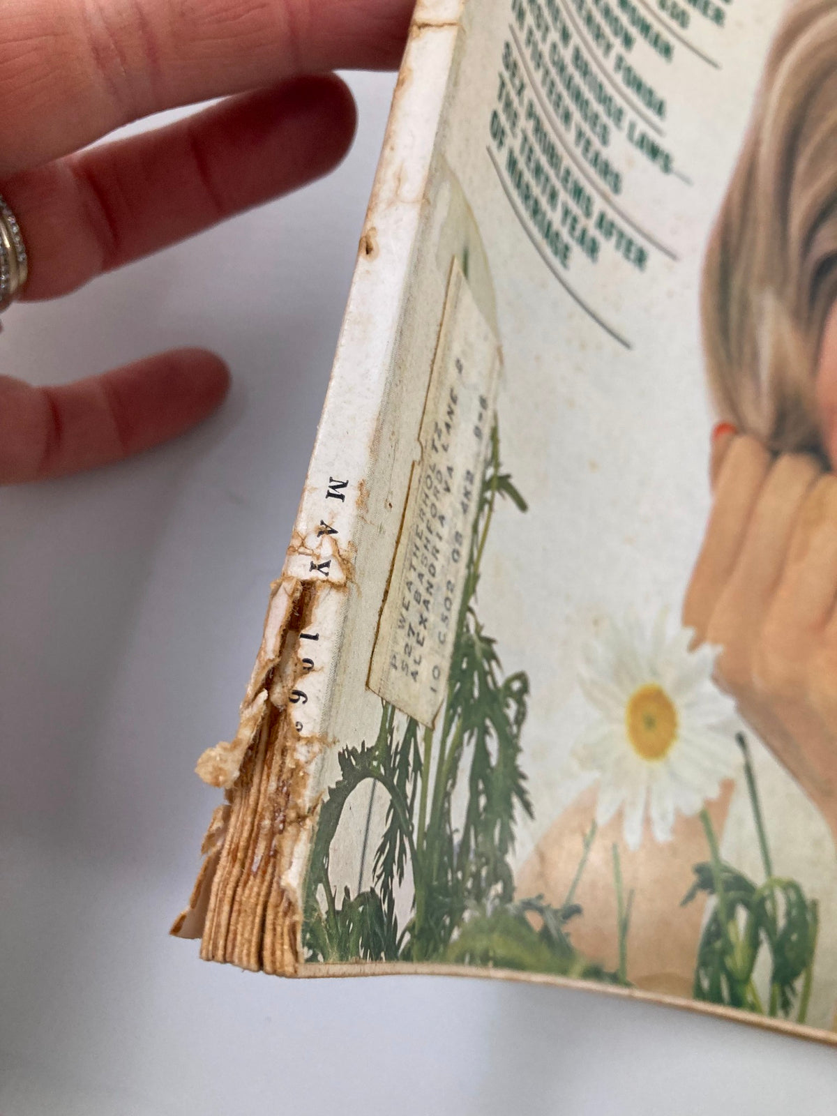 Side view of VTG McCall's Magazine May 1963 showing wear and bindings, featuring Shirley Temple's article 'Tomorrow I'll Be 35'.