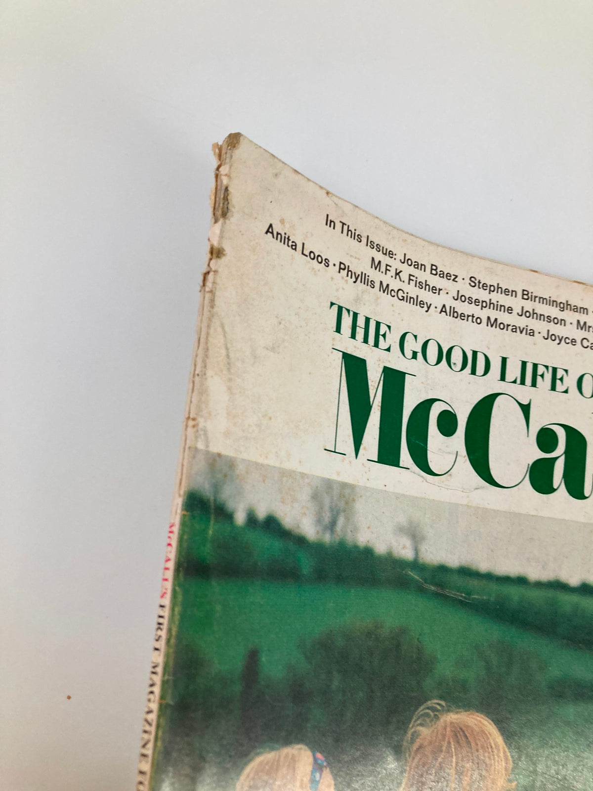 Detail shot of the top corner of VTG McCall's Magazine January 1970, showcasing wear and tear on the cover, retaining the title 'The Good Life on Earth'.