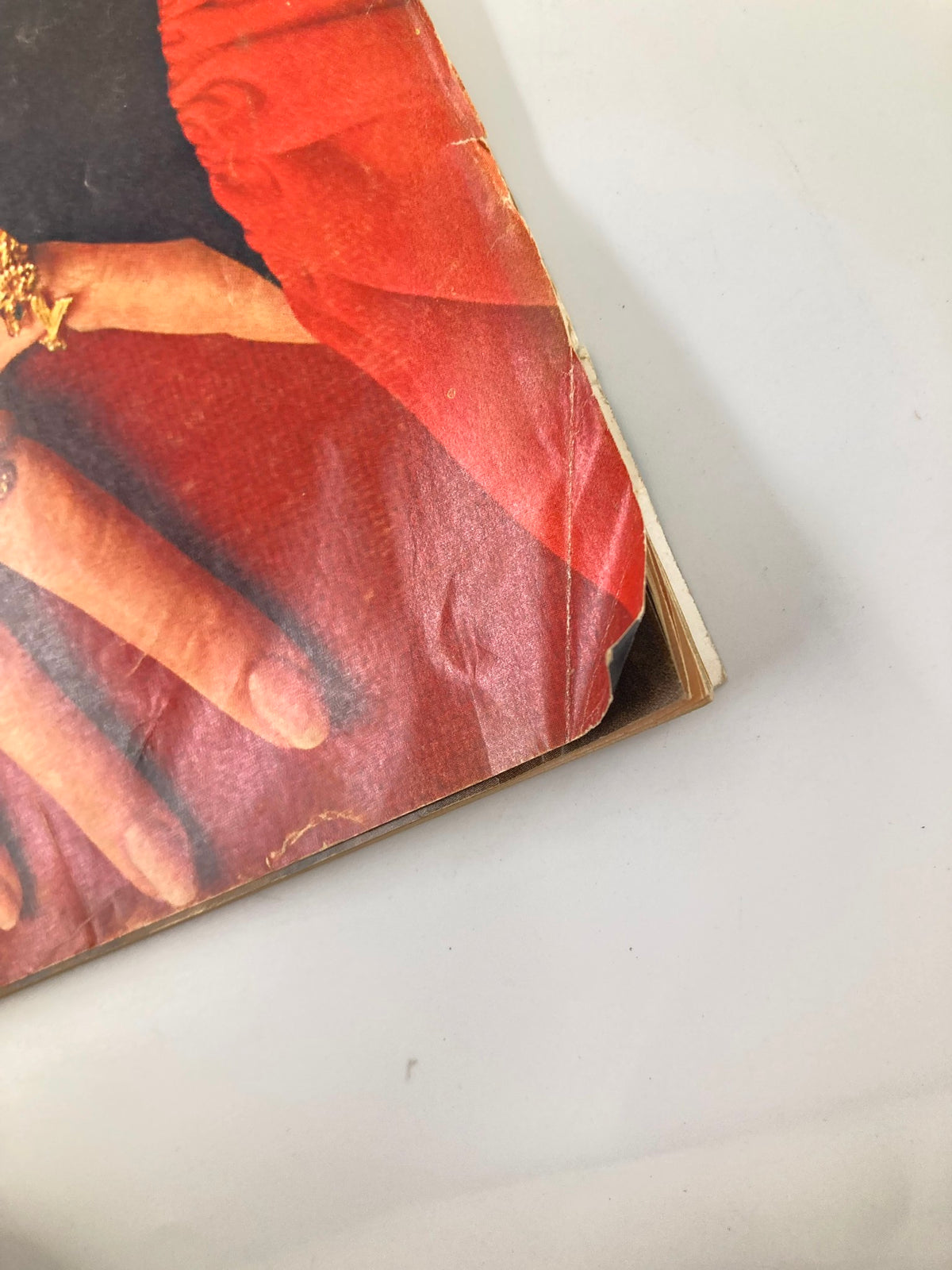Detailed view of the edge of the VTG McCall's Magazine January 1969, showing creases and wear that emphasize its vintage condition.