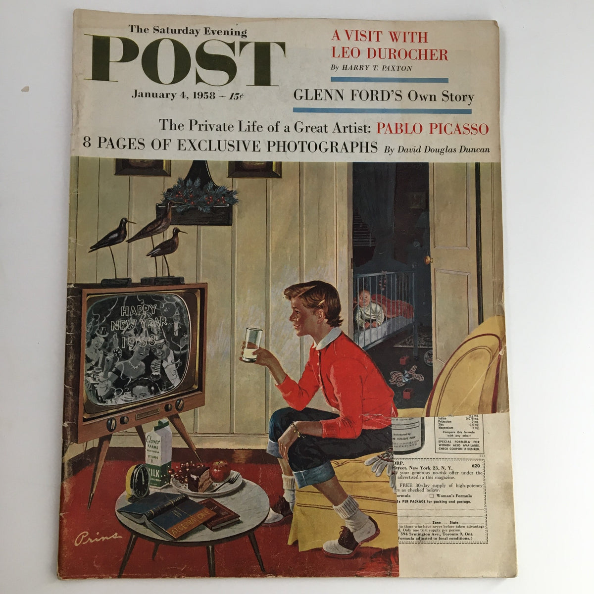 Cover of The Saturday Evening Post dated January 4, 1958, featuring the title 'A Visit with Leo Durocher' by Harry P. The cover depicts a cozy living room scene with a young man watching television and celebrating New Year's.