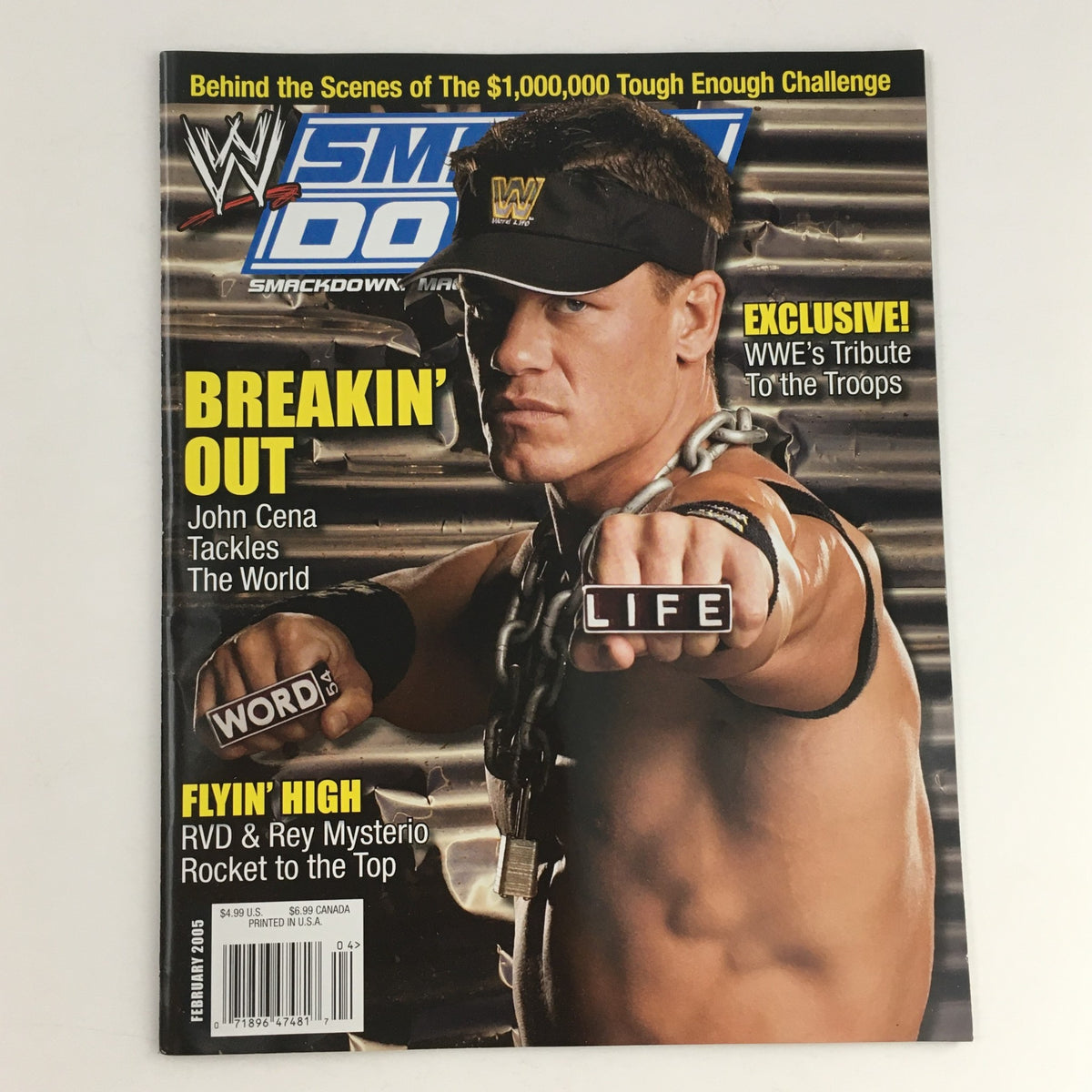 WWE Raw Magazine February 2005 cover featuring John Cena in action, promoting his unique style as he tackles the world, along with the tagline 'Breakin' Out'.