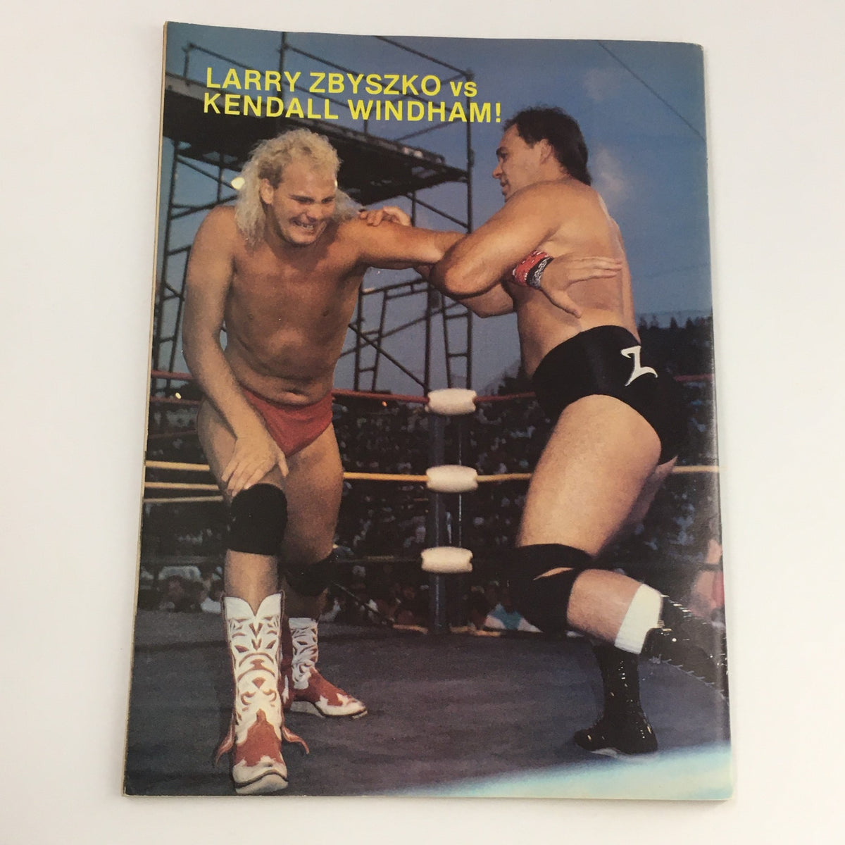 Cover of Wrestling Scene Magazine - November 1988 showcasing the match between Larry Zbyszko and Kendall Windham in a vibrant wrestling arena setting.