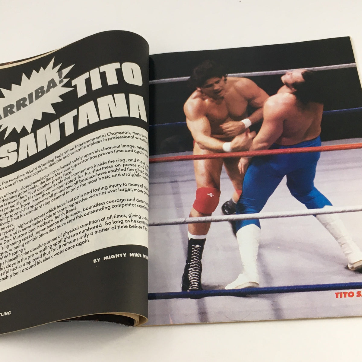 Inside page of the Gold Belt Wrestling Magazine from November 1987 featuring an article about wrestling champion Tito Santana, showcasing a wrestling match action scene.
