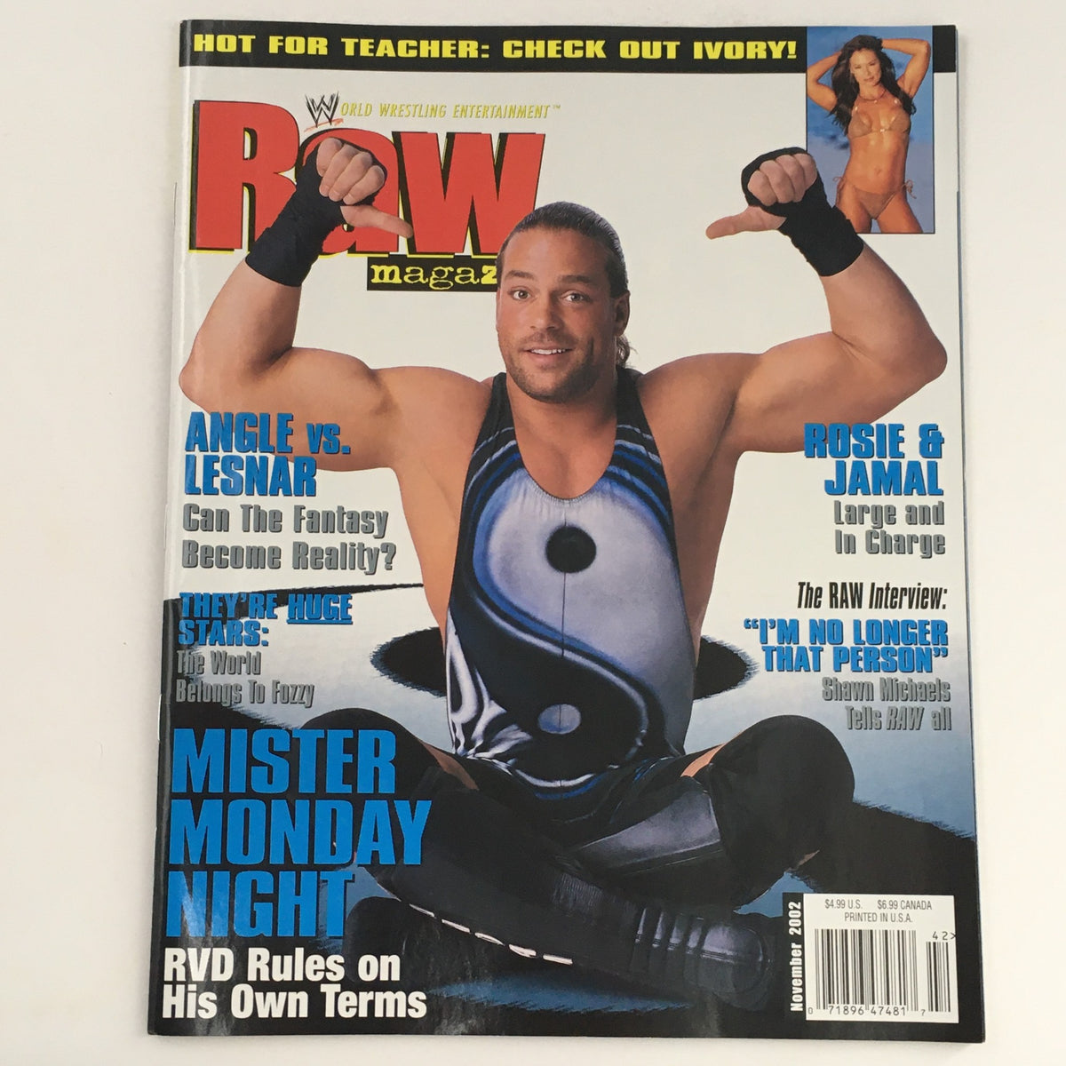 WWE Raw Magazine November 2002 cover featuring Rob Van Dam in a striking pose and Kurt Angle, highlighting their iconic status in wrestling.