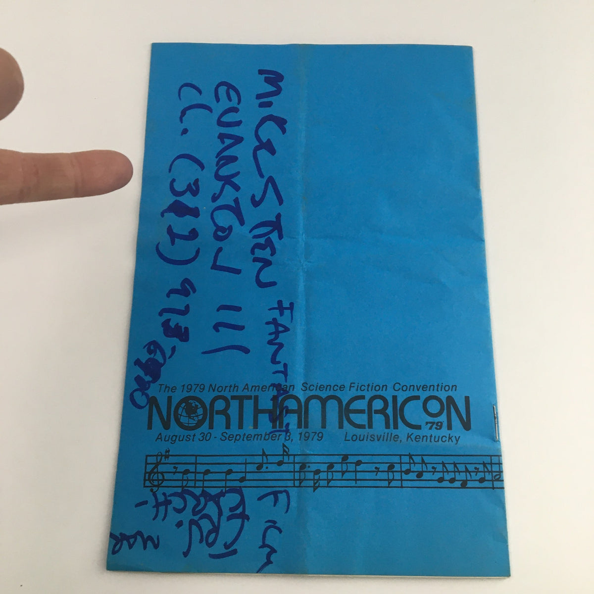 Back cover of the North American Presents September 1979 Riverboat Filksing Souvenir Programme displaying writing and annotations, emphasizing its vintage authenticity.