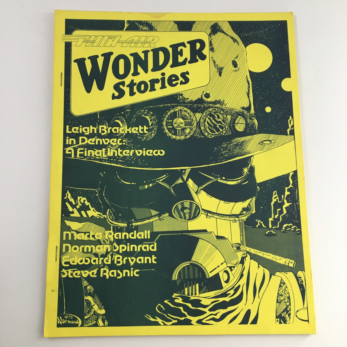 Cover of Den Visions Vol 1 No. 1 (1978) featuring vibrant graphics and title 'Thin Air Wonder Stories'; includes notable features like 'Leigh Brackett in Denver: A Final Interview.'