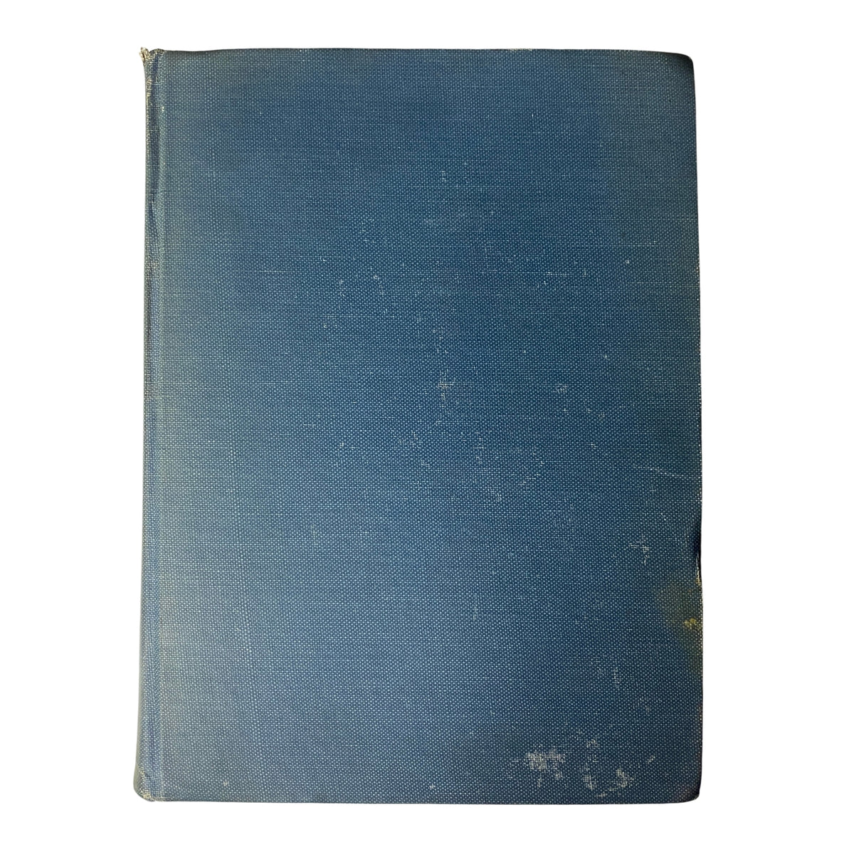Back cover of a bound edition of Time Magazine, featuring a worn blue cloth cover, indicative of its age and historical significance.