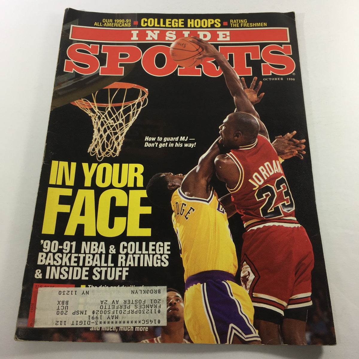 Cover of VTG Inside Sports Magazine October 1990 featuring NBA players Michael Jordan and Orlando Woolridge, showcasing a dramatic basketball moment with the title 'IN YOUR FACE' prominently displayed.