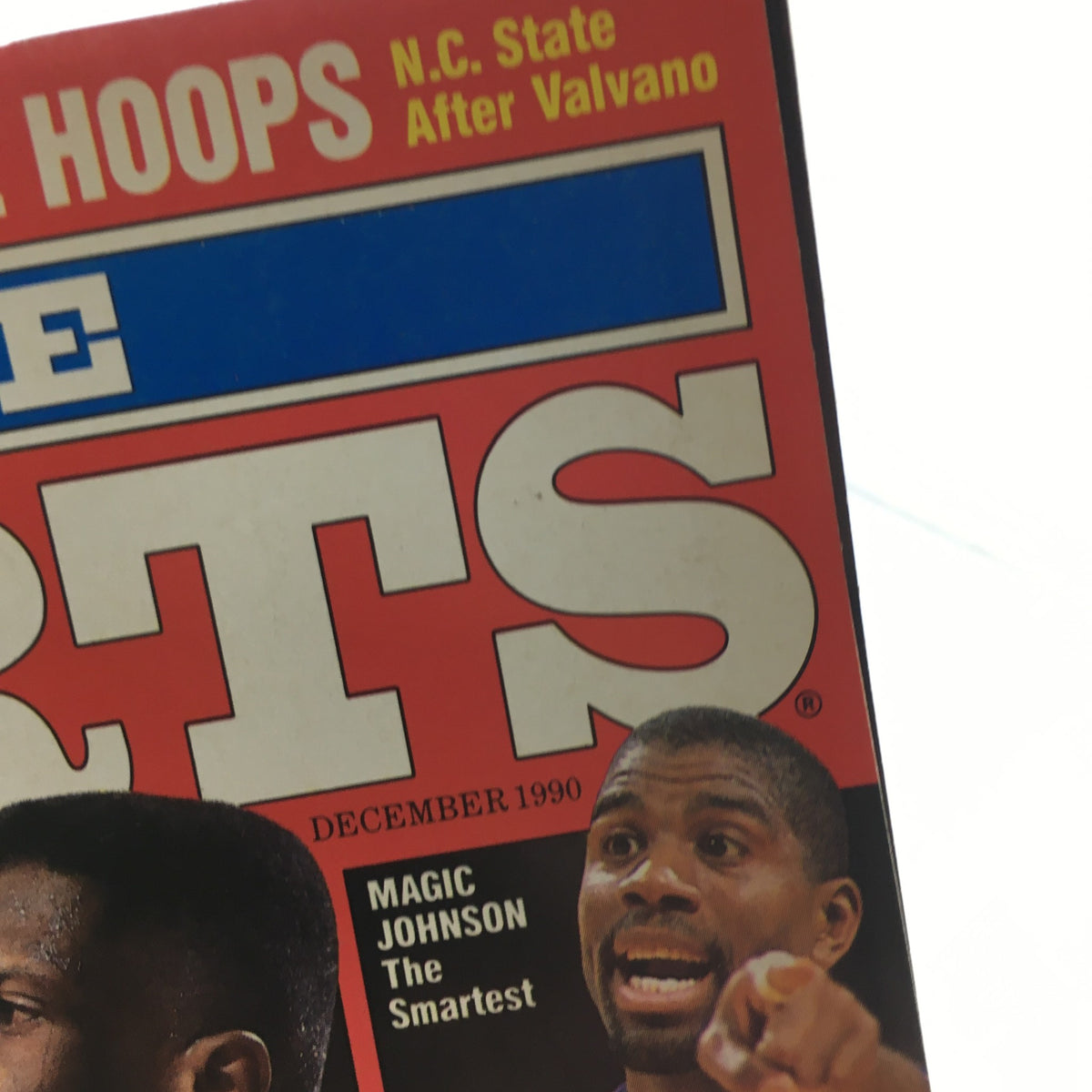 Cover of Inside Sports Magazine December 1990 featuring NBA legends Michael Jordan and Magic Johnson, highlighting an iconic moment in basketball history.