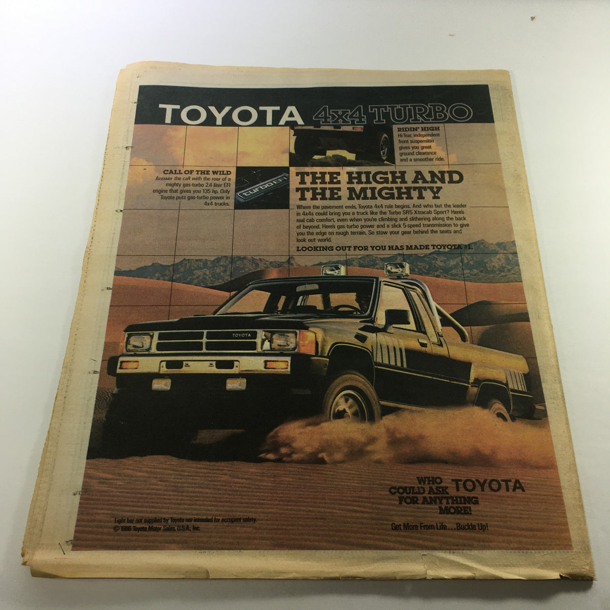VTG The Sporting News May 18 1987, showcasing an advertisement for Toyota 4x4 Turbo truck with a rugged off-road setting, emphasizing durability and adventure.