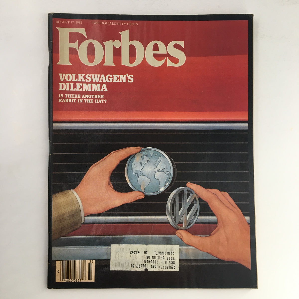 Forbes Magazine cover from August 17, 1981 featuring the title 'Volkswagen's Dilemma: Is There Another Rabbit in the Hat?'. The cover art includes hands holding a globe and VW logo against a stylized automotive background, representing the challenges faced by Volkswagen in the automotive industry during the early 1980s.