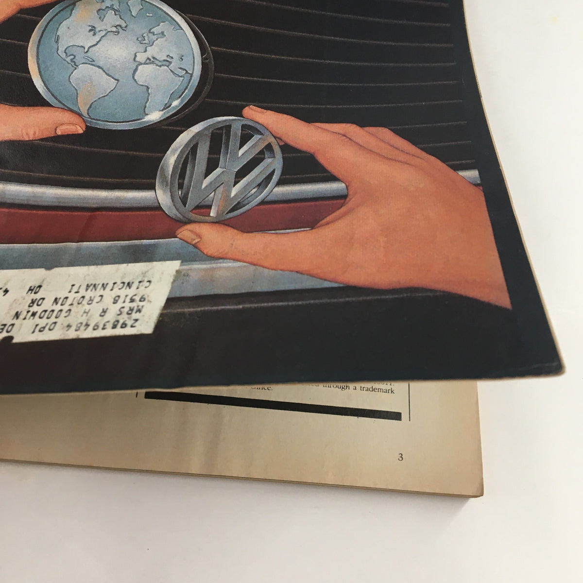 Cover of Forbes Magazine from August 17, 1981, depicting a hand placing a Volkswagen logo on a car grill, illustrating the article titled 'Volkswagen's Dilemma: Another Rabbit in the Hat?' highlighting automotive challenges.