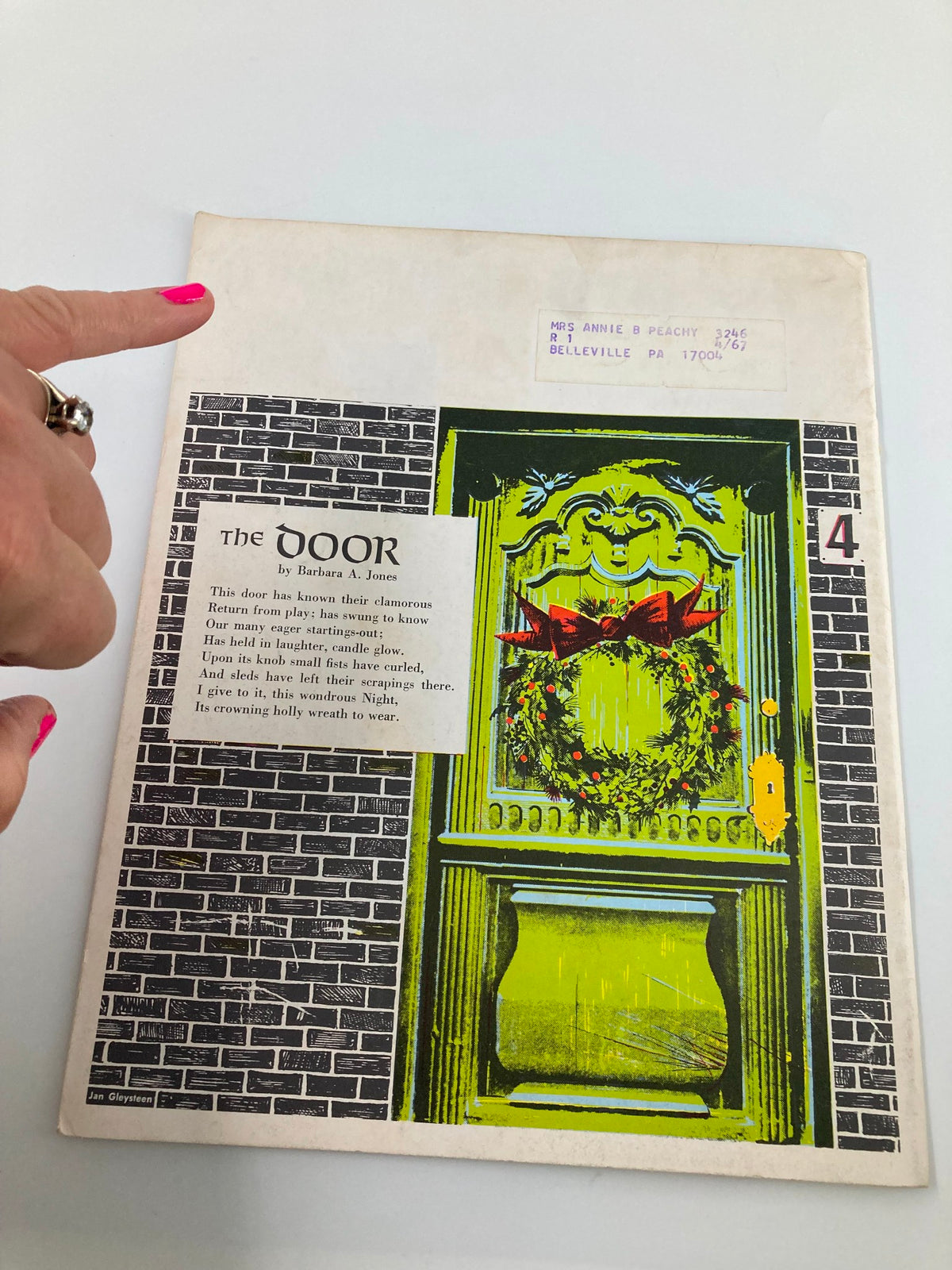 Back cover of VTG Christian Living Magazine December 1966 showing a decorative green door adorned with a wreath, accompanied by text, perfect for vintage magazine enthusiasts.