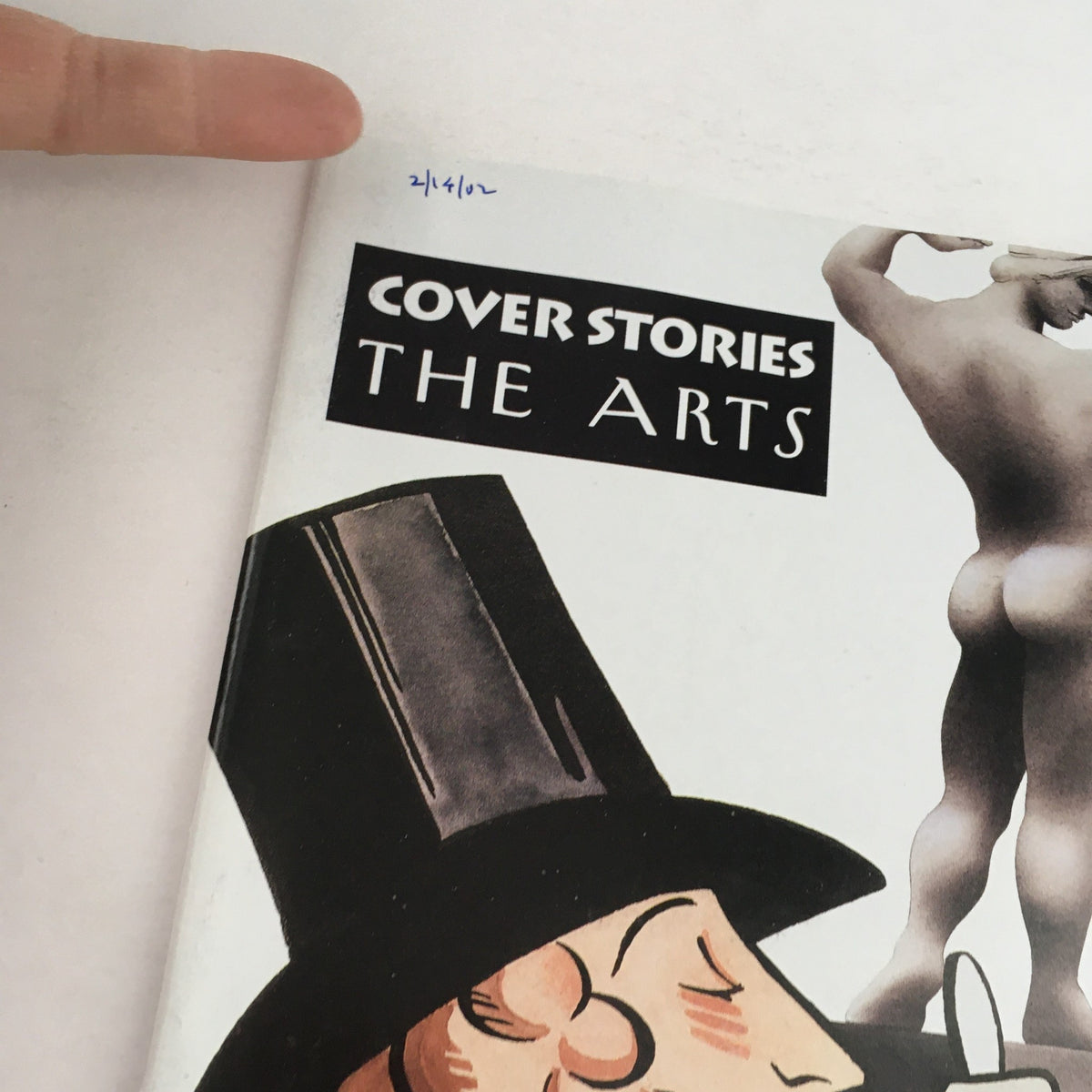 Close-up view of The New Yorker February 14 2002 cover highlighting the title 'COVER STORIES THE ARTS' and details of the artistic design by Ian Falconer.