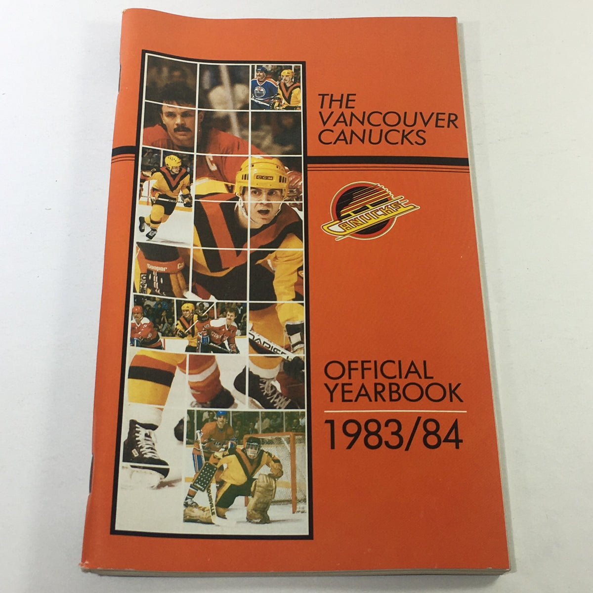 VTG NHL Official Yearbook 1983-1984 - Vancouver Canucks featuring a colorful cover with images of players and the team's logo.