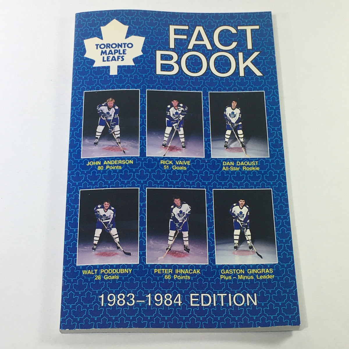 VTG NHL Official Fact Book - Toronto Maple Leafs cover image featuring players John Anderson, Rick Vaive, Dan Daoust, Walt Poddubny, Peter Ihnacak, and Gaston Gingras from the 1983-1984 season.