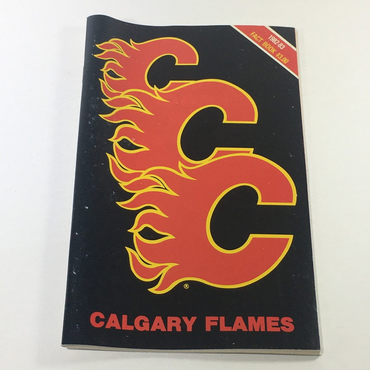 VTG NHL Official Fact Book 1982-1983 - Calgary Flames cover featuring the iconic flaming C logo.