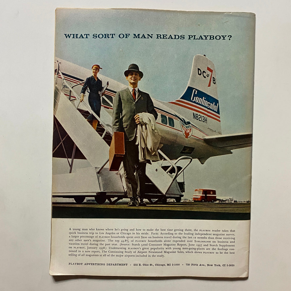 Back cover of VTG Playboy Magazine September 1958, featuring a man in a suit with a magazine, advertising the magazine's appeal.