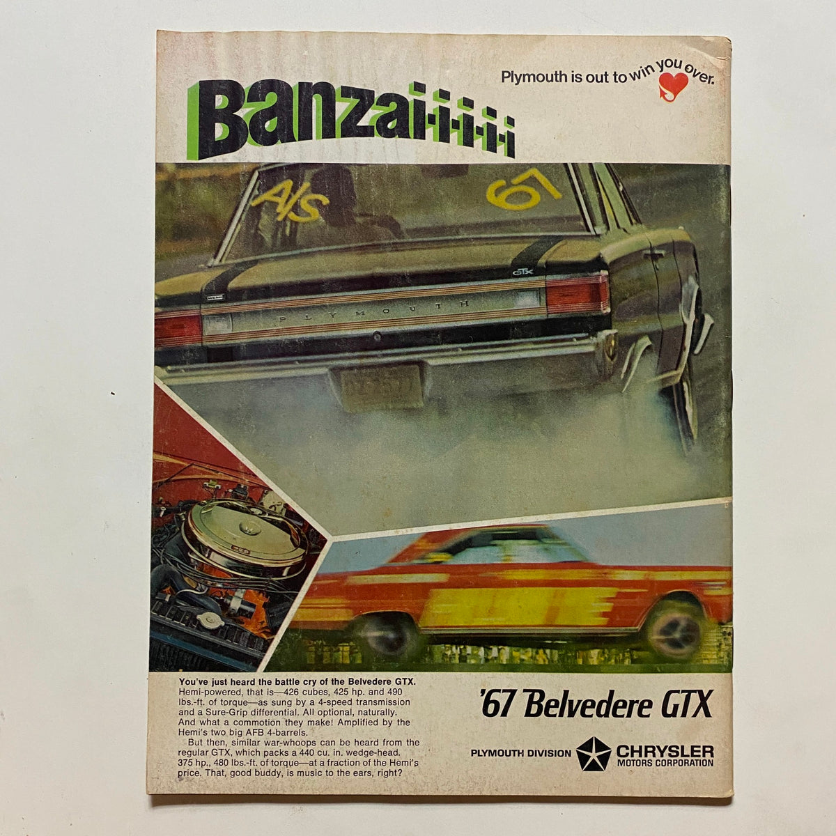 Promotional image from Plymouth for the '67 Belvedere GTX featured in the Vintage Popular Hot Rodding Magazine December 1966, highlighting performance specs and design.