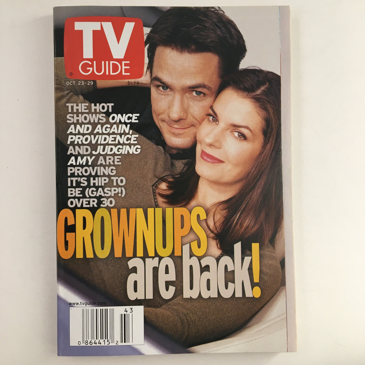 Cover of TV Guide Magazine from October 23, 1999 featuring a prominent title 'GROWNUPS are back!' along with a cover story on shows like Once And Again, Providence, and Judging Amy. The issue showcases actors Amy and Seth Peterson, representing late 90s pop culture.