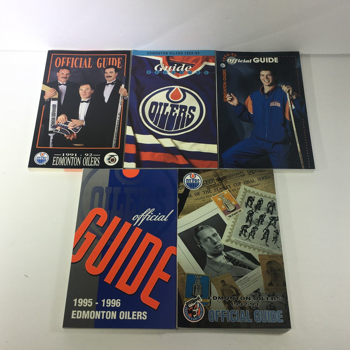 Lot of 5 VTG NHL Official Edmonton Oilers Guide 1991 - 1996, featuring covers from the 1991-92 to 1995-96 seasons with vibrant graphics and team branding.