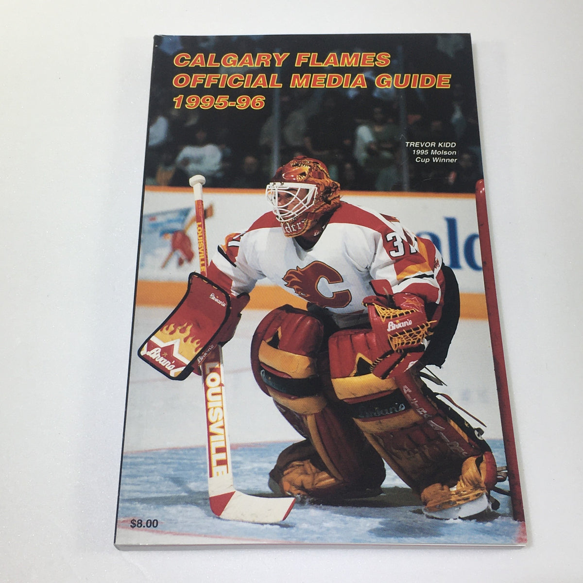 Lot of 7 VTG NHL Official Calgary Flames Media Guide 1990 - 1997 featuring the 1995-96 media guide with goalie Trevor Kidd on the cover.