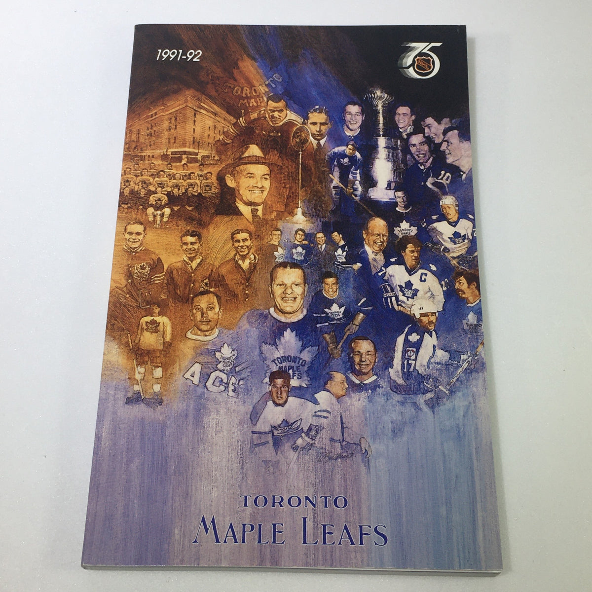 1991-92 Toronto Maple Leafs Yearbook with a collage of historical players and moments, part of the Lot of 8 VTG NHL Official Toronto Maple Leafs Official Guide Yearbook 1987-1997 collection.