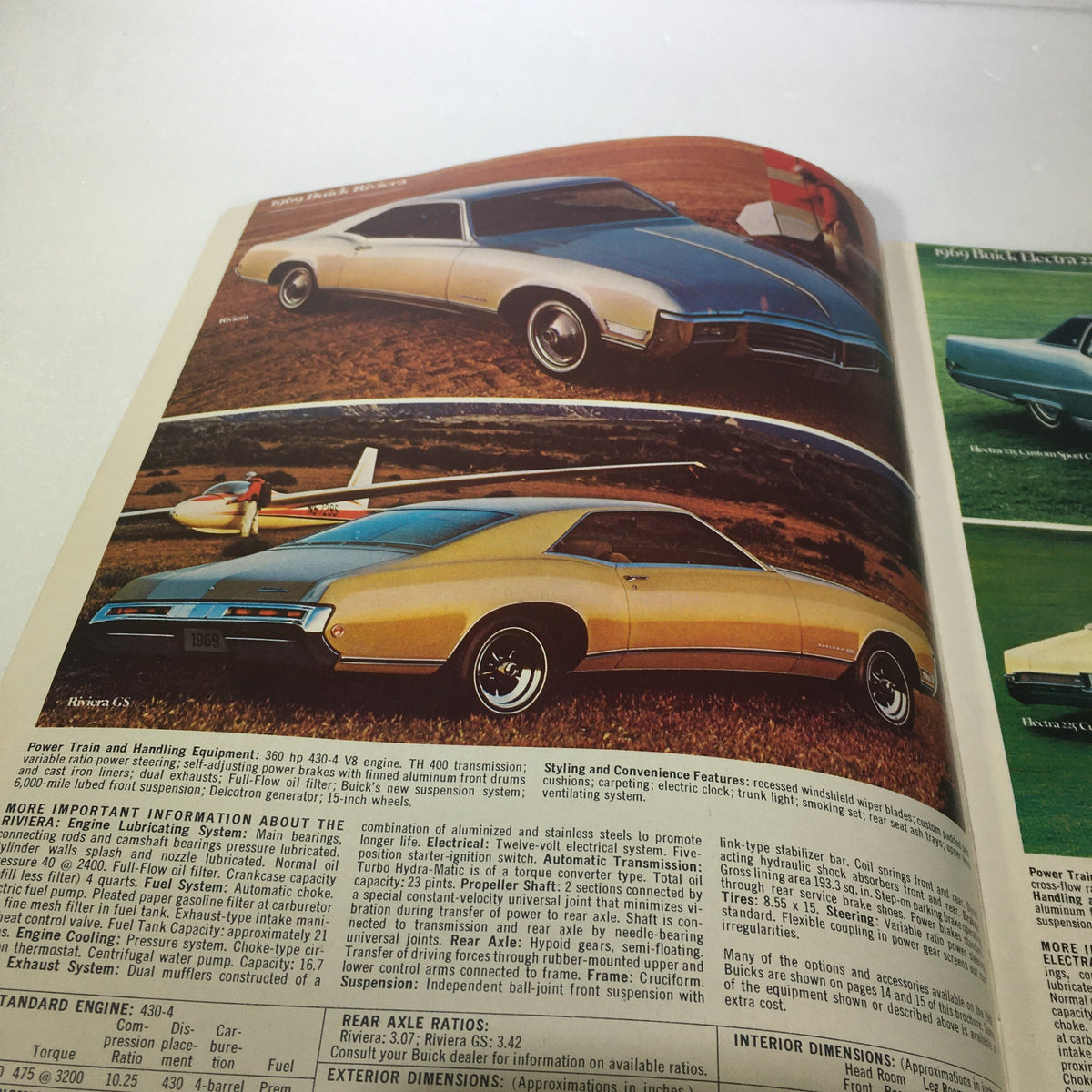 Interior pages of the VTG 1969 Buick Riviera GS Electra Custom Sport Coupe Car Auto Brochure Catalog, showcasing detailed images of the Buick Riviera GS, including styling features and specifications.