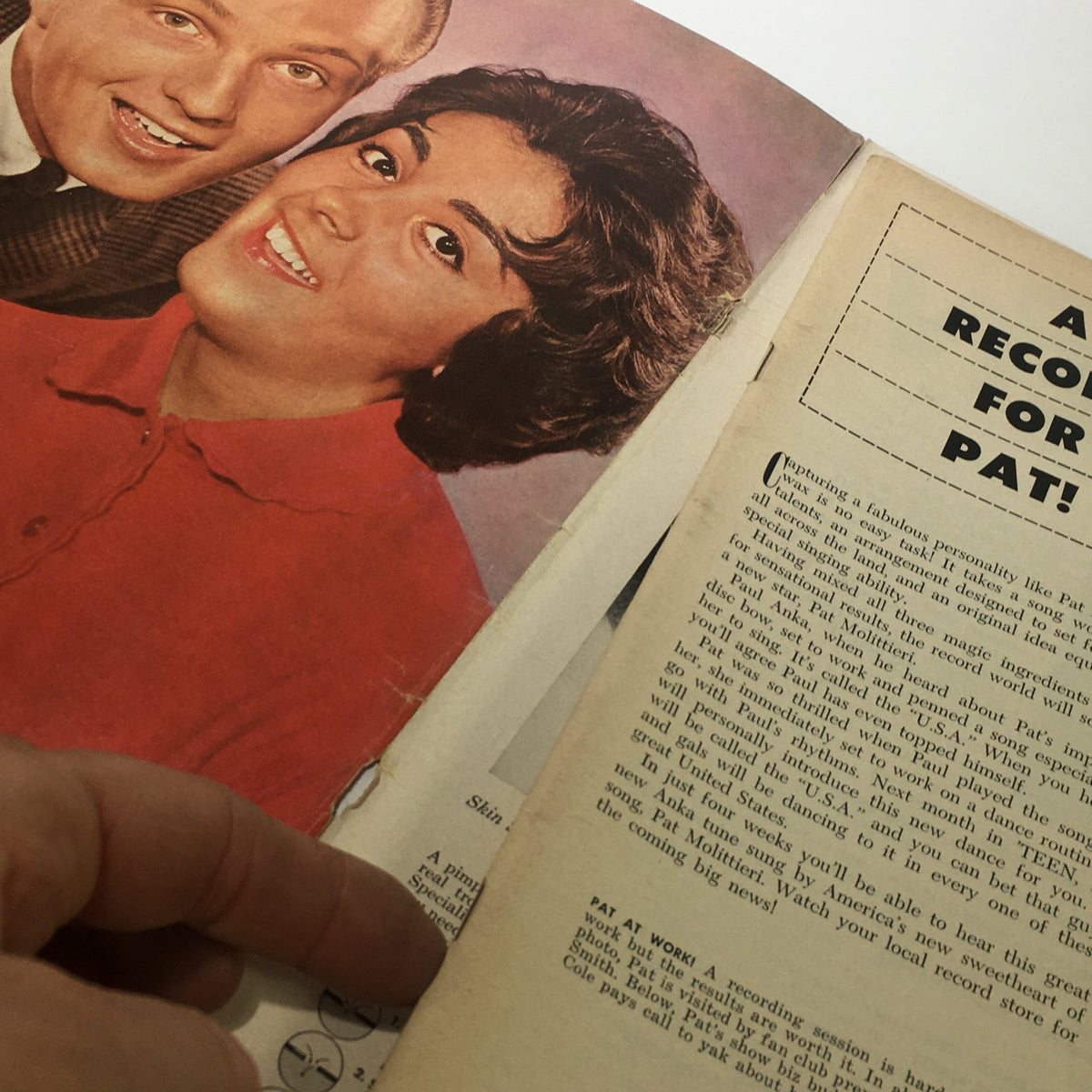 Double-page spread from May 1961 Teen Magazine featuring a smiling couple and a peek into an article discussing a record for Pat.