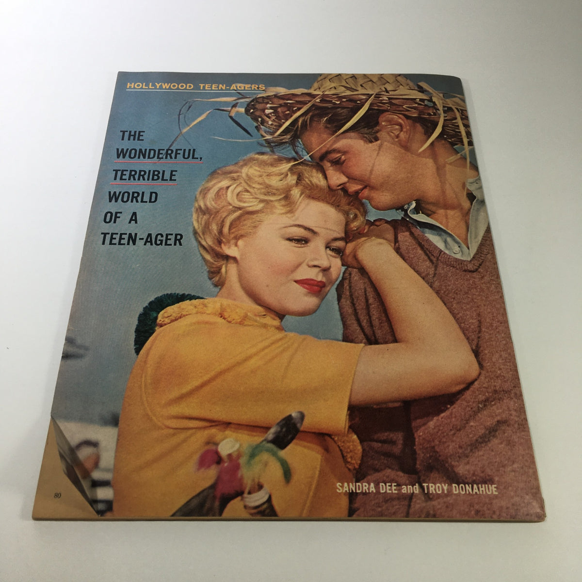 Another cover of Hollywood Teen-Agers magazine with a vibrant image of Sandra Dee and Troy Donahue, capturing the essence of teenage life in the 1960s.