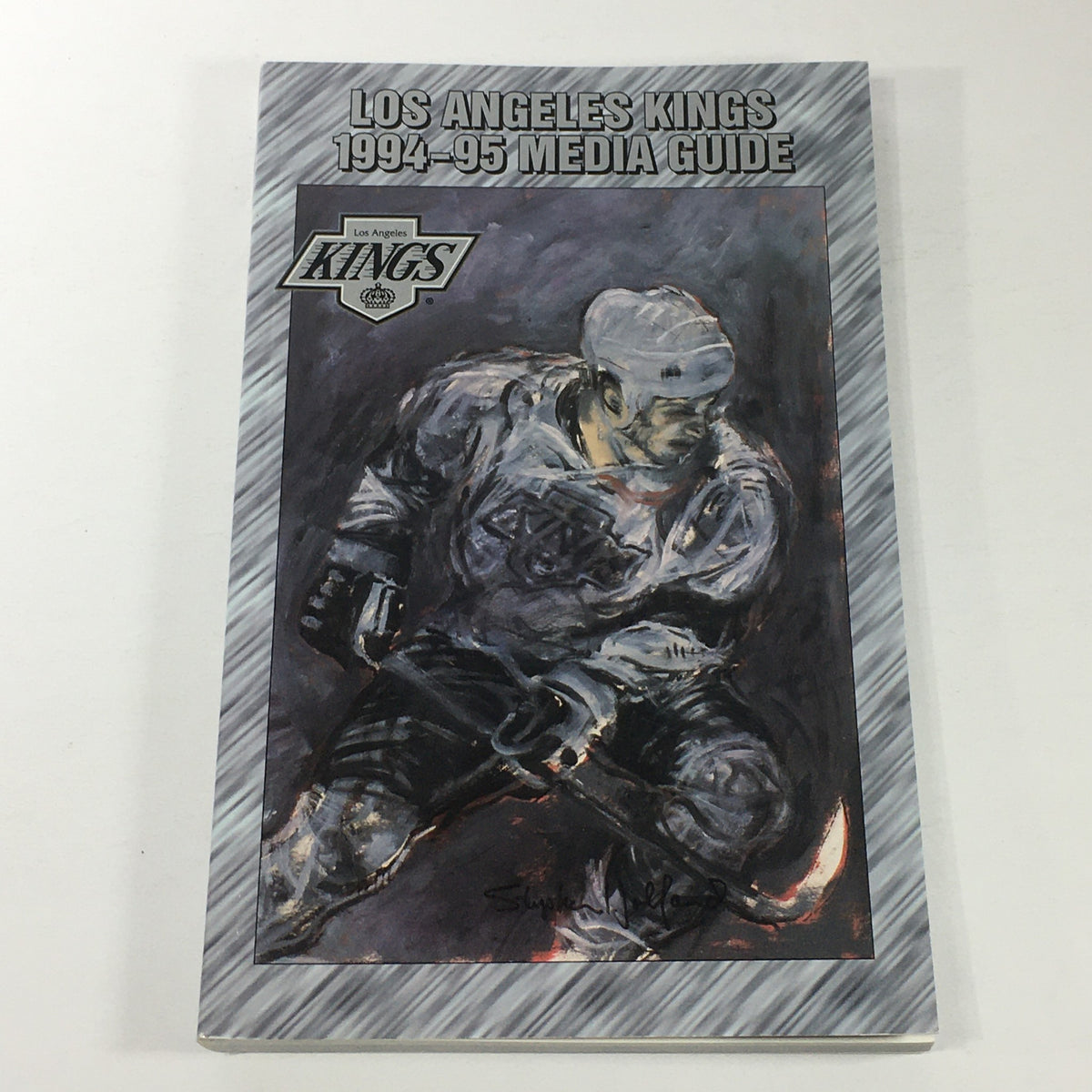 VTG NHL Official Media Guide 1994-1995 - Los Angeles Kings cover featuring an artistic depiction of a player on the ice.