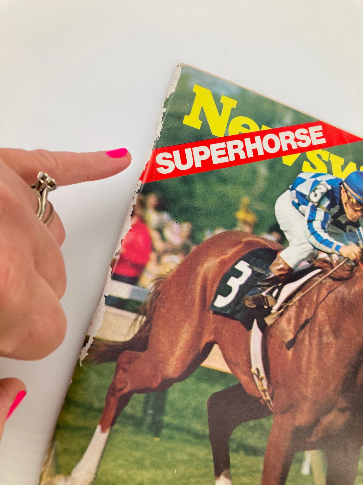 Close-up of the cover of VTG Newsweek Magazine June 11 1973 featuring the bold title 'SUPERHORSE' in red, highlighting Secretariat, the legendary Thoroughbred racehorse.