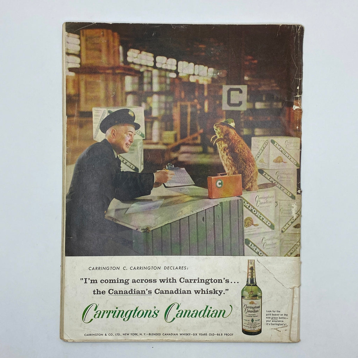 Back cover of VTG Playboy Magazine June 1959 featuring an advertisement for Carrington's Canadian whisky with a man and a beaver.