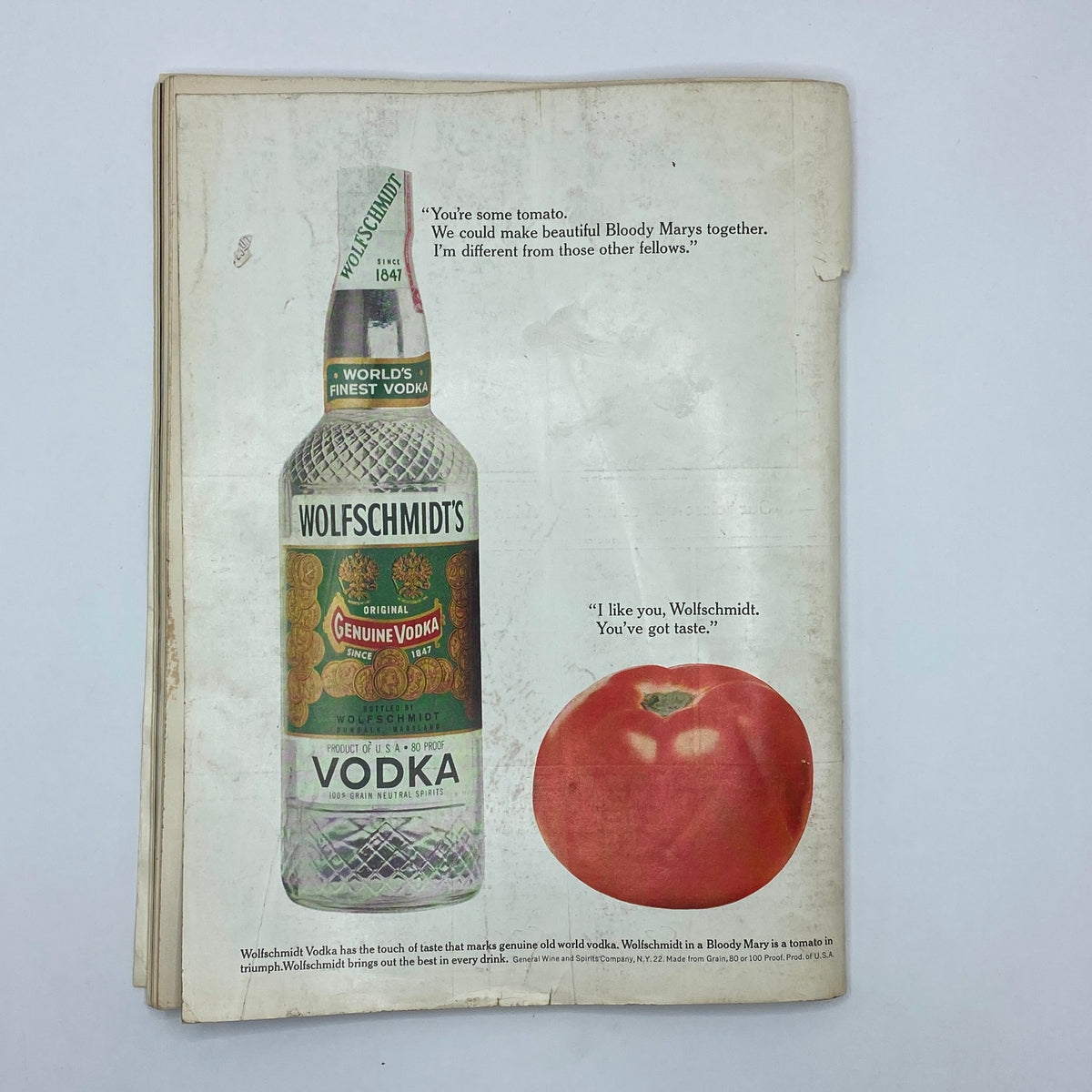 Interior advertisement page from VTG Playboy Magazine November 1961, featuring Wolfschmidt's vodka and a creative dialogue with a tomato.