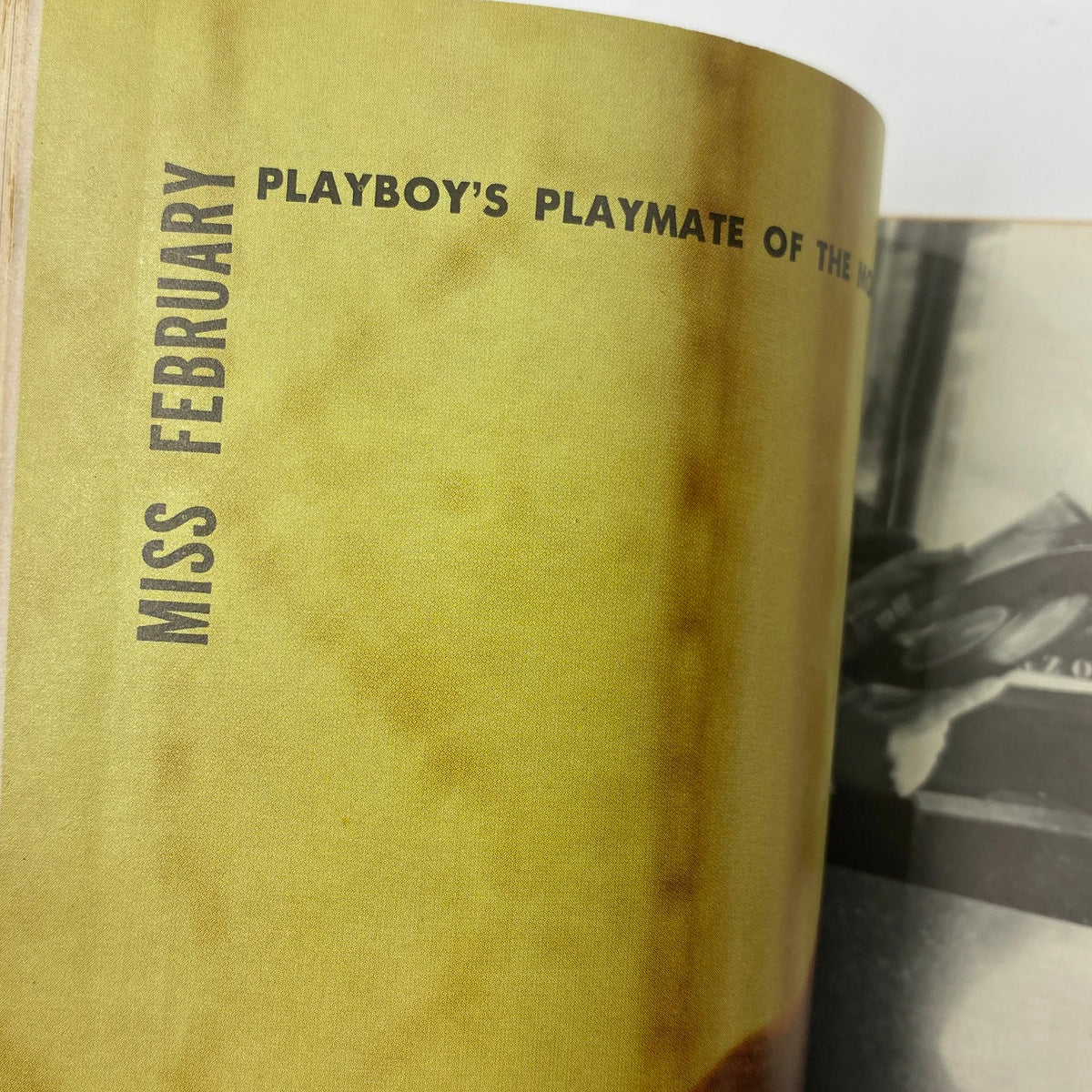 Interior page from the February 1960 Playboy Magazine indicating the Playmate of the Month, showcasing the vintage magazine's signature layout.