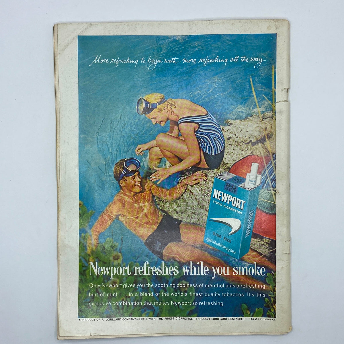 Advertisement page from VTG Playboy Magazine February 1962, featuring a vintage Newport cigarette ad with nostalgic themes.