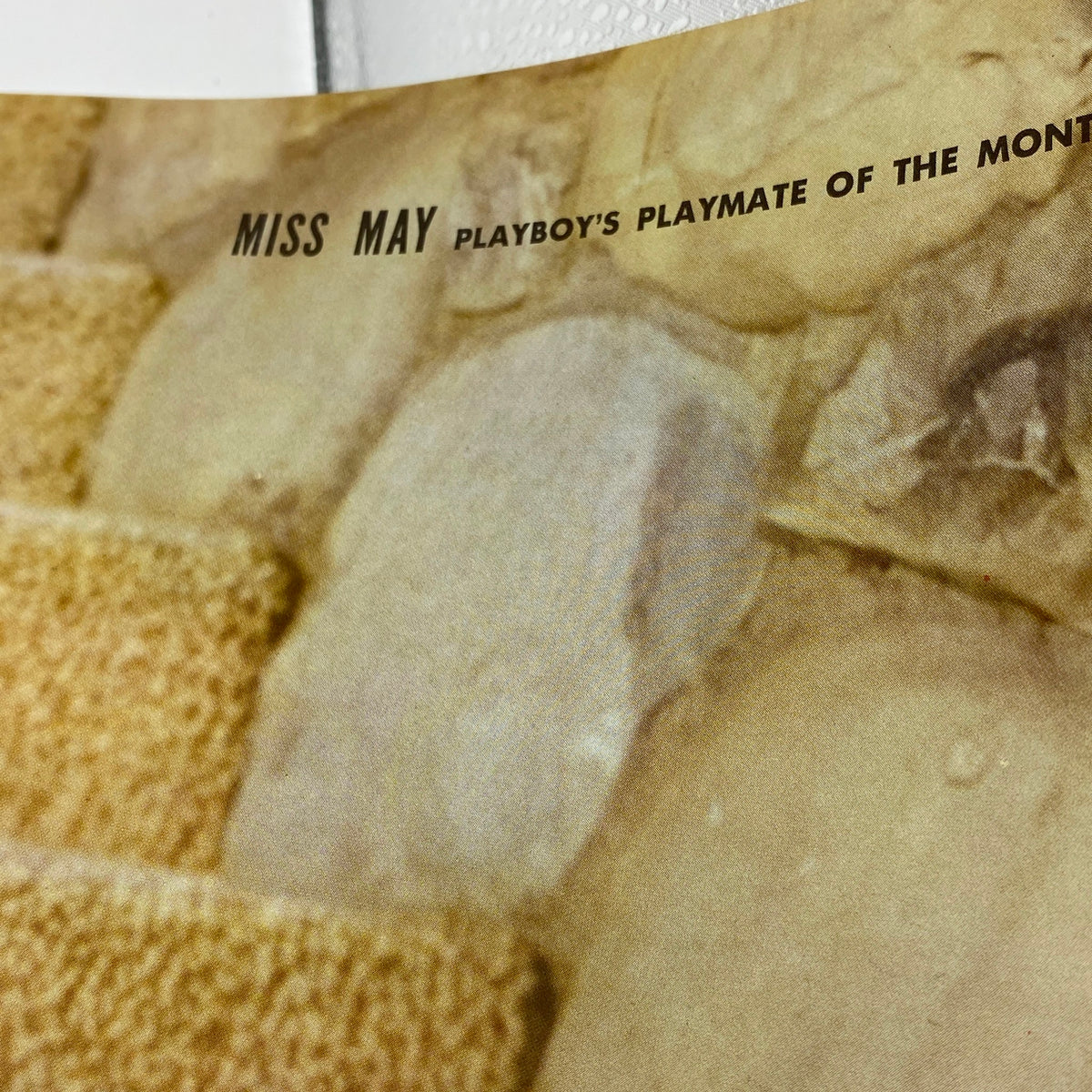 Interior page of VTG Playboy Magazine May 1961, highlighting 'Miss May' as Playboy's Playmate of the Month, showcasing vintage magazine layout.