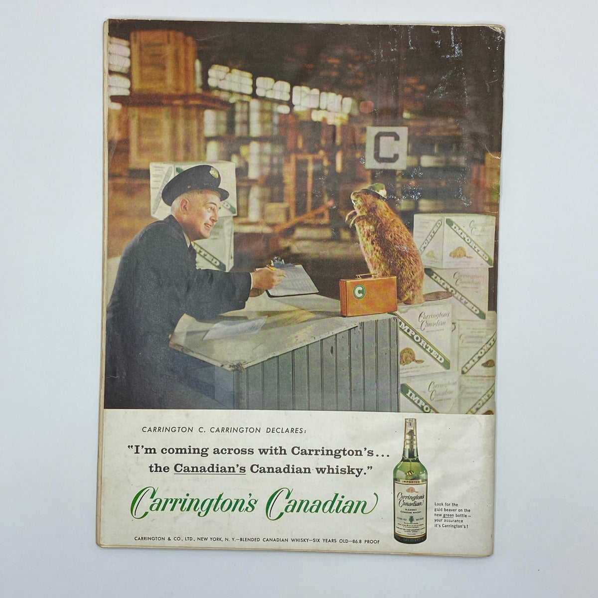 VTG Playboy Magazine June 1959 advertisement page featuring a humorous whiskey promotion, depicting a smiling customs officer at a desk with a beaver, emphasizing vintage styling.