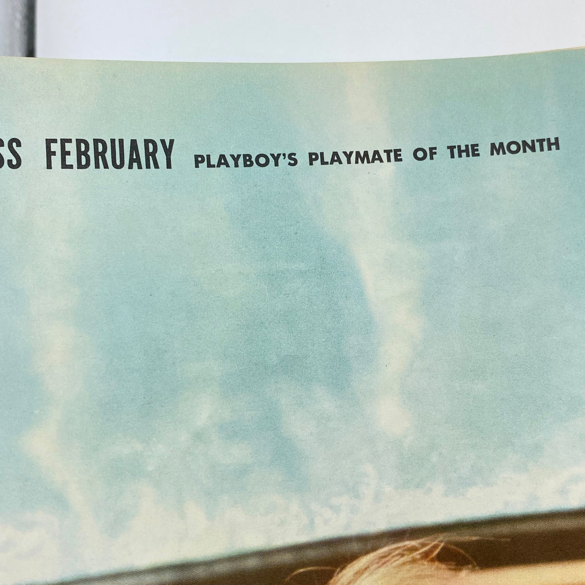 Vintage Playboy Magazine February 1958 showcasing 'Playboy's Playmate of the Month'. This image highlights the magazine's iconic header with elegant typography.