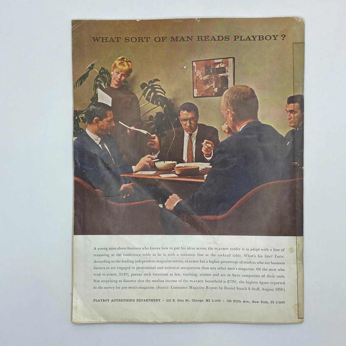 VTG Playboy Magazine November 1958, showcasing a group of men engaged in discussion at a conference table, with a woman observing in the background, encapsulating the cultural essence of the era.